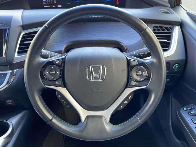 ホンダ ジェイド ハイブリッド X 愛媛県 2015(平27)年 8.9万km プレミアムディープロッソパール 純正ナビ/バックカメラ/ETC/ワンセグテレビ/Bluetooth接続/ワンオーナー/純正フロアマット/３列シート/ドライブレコーダー/ハーフレザーシート/レーンキープアシスト/衝突被害軽減システム/２列目エアコン/アイドリングストップ/純正アルミホイール/スマートキー/オートライト