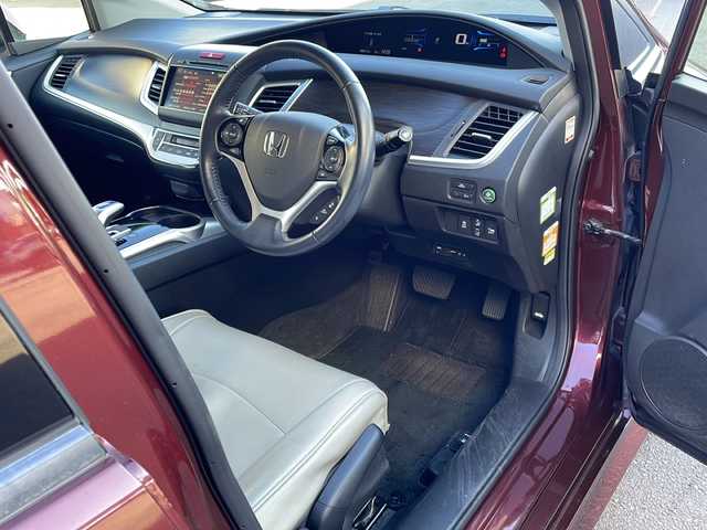 ホンダ ジェイド ハイブリッド X 愛媛県 2015(平27)年 8.9万km プレミアムディープロッソパール 純正ナビ/バックカメラ/ETC/ワンセグテレビ/Bluetooth接続/ワンオーナー/純正フロアマット/３列シート/ドライブレコーダー/ハーフレザーシート/レーンキープアシスト/衝突被害軽減システム/２列目エアコン/アイドリングストップ/純正アルミホイール/スマートキー/オートライト
