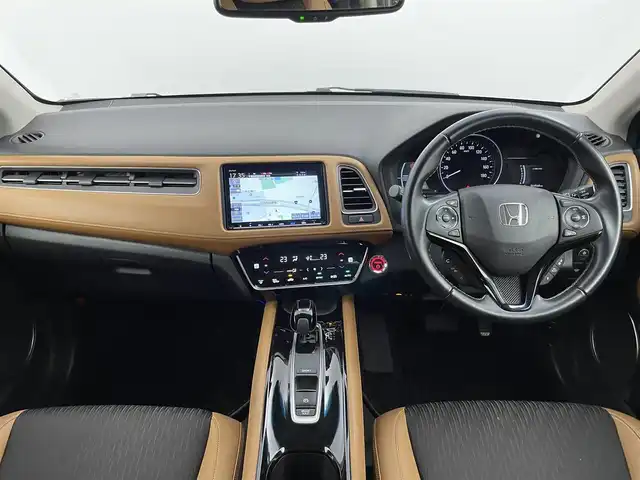 ホンダ ヴェゼル ハイブリッド Z ホンダセンシング 千葉県 2020(令2)年 6.5万km スーパープラチナグレーメタリック ワンオーナー/ホンダセンシング/・アダプティブクルーズコントロール/・衝突被害軽減ブレーキ/・車線逸脱警報/・オートハイビーム/Gathersナビ/（CD/DVD/bluetooth/HDMI/USB/フルセグ）/バックカメラ/ハーフレザーシート/D/N席パワーシート/ビルトインETC/前後ドライブレコーダー/革巻きステアリング/パドルシフトイ/ステアリングスイッチ/純正フロアマット/ドアバイザー/純正17インチAW