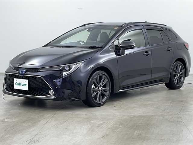 トヨタ カローラツーリング ハイブリッド ダブルバイビー 道央・札幌 2021(令3)年 1.9万km スパークリングブラックパールクリスタルシャイン ・ワンオーナー/・4WD/・純正ＳＤナビ&フルセグTV&DVD&CD&USB&BT/・バックカメラ/・セーフティセンス/・プリクラッシュセーフティ/・レーンキープアシスト/・レーダークルーズコントロール/・オートマチックハイビーム/・ロードサインアシスト/・ドライブスタートコントロール/・車両接近通報装置/・純正フロアマット/・ドアバイザー/・ビルトインETC/・LEDヘッドライト/・フォグランプ/・オートライト/。オートマチックハイビーム/・スマートキー/・スペアキー/・保証書/・取扱説明書
