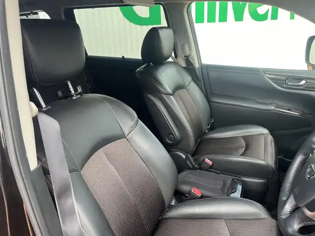 日産 エルグランド 250ハイウェイスターS 三重県 2015(平27)年 12.5万km ファントムブラック ワンオーナー/純正8インチナビMM514D-L/フリップダウンモニター/両側パアースライドドア/バックドアオートクロージャー/クルーズコントロール/LEDヘッドランプ/ハーフレザーシート/18インチアルミホイール