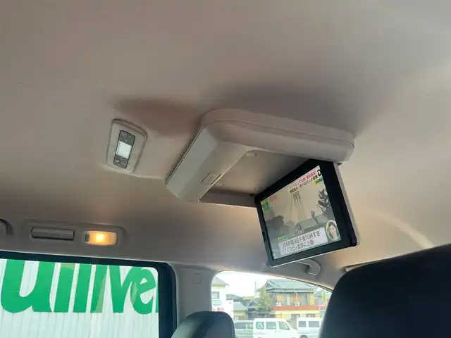 日産 エルグランド 250ハイウェイスターS 三重県 2015(平27)年 12.5万km ファントムブラック ワンオーナー/純正8インチナビMM514D-L/フリップダウンモニター/両側パアースライドドア/バックドアオートクロージャー/クルーズコントロール/LEDヘッドランプ/ハーフレザーシート/18インチアルミホイール