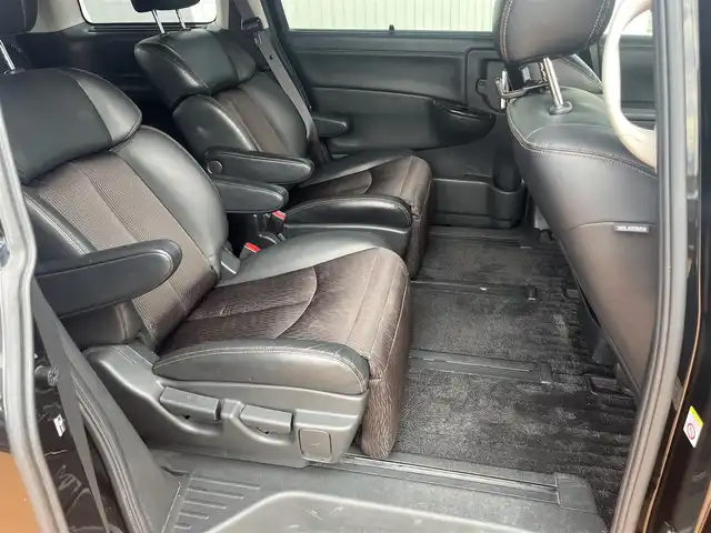 日産 エルグランド 250ハイウェイスターS 三重県 2015(平27)年 12.5万km ファントムブラック ワンオーナー/純正8インチナビMM514D-L/フリップダウンモニター/両側パアースライドドア/バックドアオートクロージャー/クルーズコントロール/LEDヘッドランプ/ハーフレザーシート/18インチアルミホイール