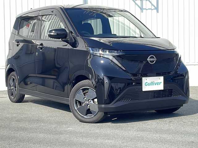 日産 サクラ X 三重県 2023(令5)年 4.3万km ブラック 禁煙/純正9型ディスプレイオーディオ/バックカメラ/電子パーキング/スペアキー/ステアリングスイッチ/ベンチシート/レーンキープアシスト/プリクラッシュ/先行車発進告知/LEDオートライト/電動格納ミラー/保証書/取扱説明書