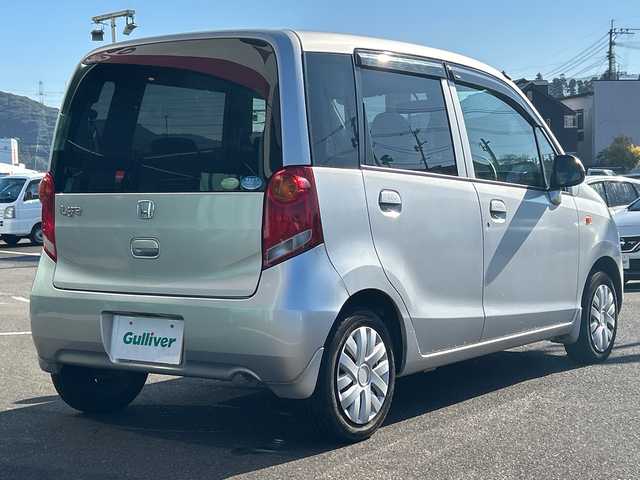 ホンダ ライフ G 鹿児島県 2010(平22)年 7万km アラバスターシルバーメタリック 純正オーディオユニット/　　CD/FM/AM/AUX/純正フロアマット/ドアバイザー/ヘッドライトレベライザー/衝突安全ボディ/前席SRSエアバッグ