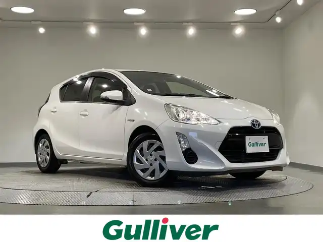 トヨタ アクア S 愛知県 2015(平27)年 6.8万km ライムホワイトパールクリスタルシャイン 純正ナビ/ビルトインＥＴＣ/Ｂｌｕｅｔｏｏｔｈ/CD/ＤＶＤ/バックカメラ/電動格納ミラー/ＩＳＯＦＩＸ/ヘッドライトレベライザー/アクセサリーソケット/ＥＣＯＭＯＤＥ/純正フロアマット/オートエアコン/キーレスキー