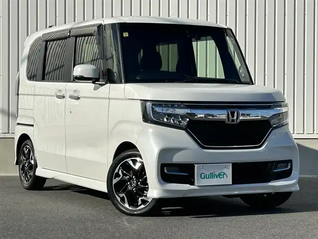 ホンダ Ｎ ＢＯＸ カスタム G L ターボ ホンダセンシング 群馬県 2018(平30)年 1.4万km プラチナホワイトパール 純正8インチナビ/（CD/DVD/SD/USB/Bluetooth/iPod）/フルセグテレビ/バックカメラ/ホンダセンシング/・衝突軽減ブレーキ/・誤発進抑制機能/・後方誤発進抑制機能/・歩行者事故低減ステアリング/・先行車発進お知らせ機能/・アダプティブクルーズコントロール/・車線維持支援システム/・オートハイビーム/・標識認識機能/・路外逸脱抑制機能/ハーフレザーシート/パドルシフト/ステアリングリモコン/シーケンシャルウィンカー/ETC/LEDヘッドライト/純正フロアマット/横滑り防止