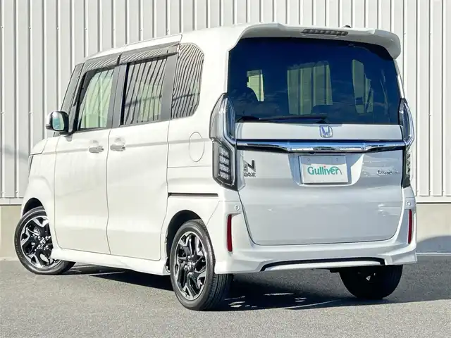 ホンダ Ｎ ＢＯＸ カスタム G L ターボ ホンダセンシング 群馬県 2018(平30)年 1.4万km プラチナホワイトパール 純正8インチナビ/（CD/DVD/SD/USB/Bluetooth/iPod）/フルセグテレビ/バックカメラ/ホンダセンシング/・衝突軽減ブレーキ/・誤発進抑制機能/・後方誤発進抑制機能/・歩行者事故低減ステアリング/・先行車発進お知らせ機能/・アダプティブクルーズコントロール/・車線維持支援システム/・オートハイビーム/・標識認識機能/・路外逸脱抑制機能/ハーフレザーシート/パドルシフト/ステアリングリモコン/シーケンシャルウィンカー/ETC/LEDヘッドライト/純正フロアマット/横滑り防止