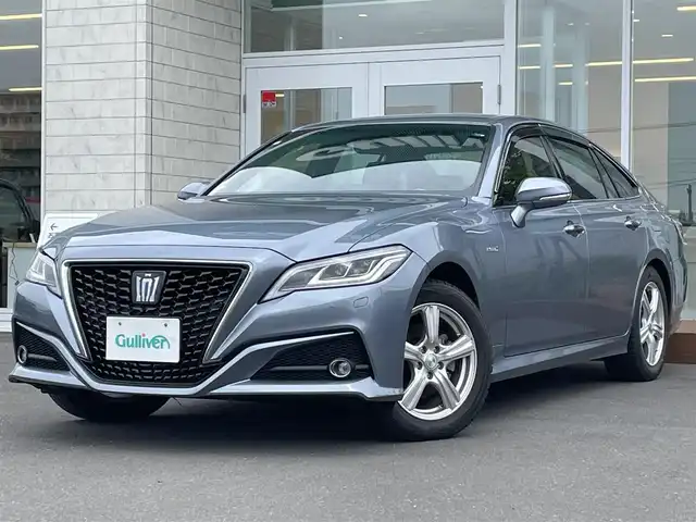 トヨタ クラウン ハイブリッド G Four 道央・札幌 2019(平31)年 1.1万km プレシャスガレナ ・４WD/・衝突軽減ブレーキ/・寒冷地仕様/・純正ナビ/　CD＆BT＆USB＆TV/・バックカメラ/・コーナーセンサー/・レーンキープアシスト/・レーダークルーズコントロール/・ブラインドスポットモニター/・プッシュスタート/・スマートキー/・パドルシフト/・オートライト/・オートエアコン/・レインセンサーワイパー/・オートリトラミラー/・パワーシート/・シートヒーター/・ワイパー熱線/・ビルトインETC/・ヘッドアップディスプレイ/・ミラーヒーター/・MT付きAT/・ハンズフリー/・ステアリングスイッチ/・純正AW＆夏タイヤ積込/・前方ドライブレコ―ダー/・純正フロアマット/・ウィンカーミラー/・フォグライト/・LEDヘッドライト