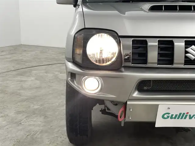 スズキ ジムニー ランドベンチャー 福島県 2016(平28)年 4.2万km スチールシルバーM ワンオーナー　/４ＷＤ　/ハーフレザーシート　/ＳＤナビ　/【AM/FM/DVD/CD/Bluetooth/フルセグ】/社外バンパー　/・社外マフラー/シートヒーター　/リモコンキー　/ハンドルリモコン　/・フォグライト　/・レベライザー　/ウィンカーミラー　/純正フロアマット /ドアバイザー/