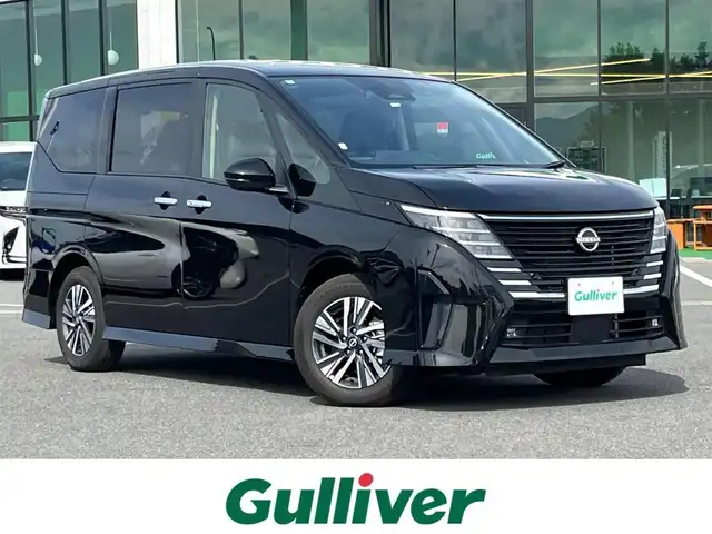 日産 セレナ ハイウェイスター V Vセレクション 大阪府 2024(令6)年 0.1千km ダイヤモンドブラック 純正ナビ（MM317D-W）/（フルセグ／ＢＴ／ＣＤ／ＤＶＤ）/フリップダウンモニター/レーダークルーズコントロール/プロパイロット/アラウンドビューモニター/パドルシフト/ブラインドスポットモニター/前後コーナーセンサー/衝突軽減システム/レーンキープアシスト/両側パワースライドドア/後席サンシェード/デジタルインナーミラー/純正16インチAW