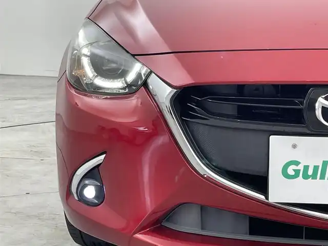 マツダ デミオ 13S ツーリング 福岡県 2016(平28)年 5.3万km ソウルレッドプレミアムメタリック 純正ナビ（ＢＴ，フルセグＴＶ）　/バックカメラ　/ＥＴＣ　/前後ドライブレコーダー　/コーナーセンサー　/スマート・シティ・ブレーキ・サポート　/レーンキープ　/ＢＳＭ　/ＭＴモード付き　/シートヒーター　/ＬＥＤライト