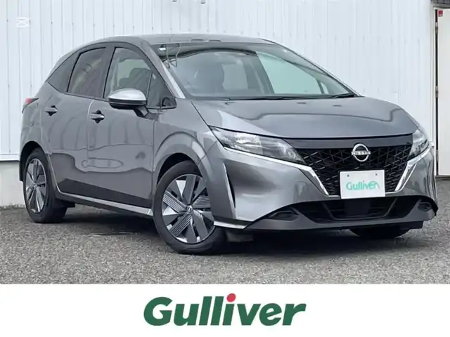 日産 ノート X 熊本県 2023(令5)年 3.8万km ダークメタルグレー 純正メモリナビ/・AM/FM/USB/HDMI/・Bluetooth/・フルセグTV/360°セーフティーアシスト/・プロパイロット/・ハンドル支援/・側方支援/・後側方支援/・エマージェンシーブレーキ/・速度標識表示/・ルート減速支援/・制限速度支援/・標識検知支援/・駐車支援/・シャシー制御（トレースコントロール）/・オートハイビーム/ビルトインETC2.0/全方位カメラ/置くだけ充電/デジタルルームミラー/ドライブモード切替/USB Type-c/ステアリングスイッチ/ボタン式サイドブレーキ/ホールドブレーキ/電動格納ミラー/ウィンカーミラー/ウィンドウロック/純正フロアマット