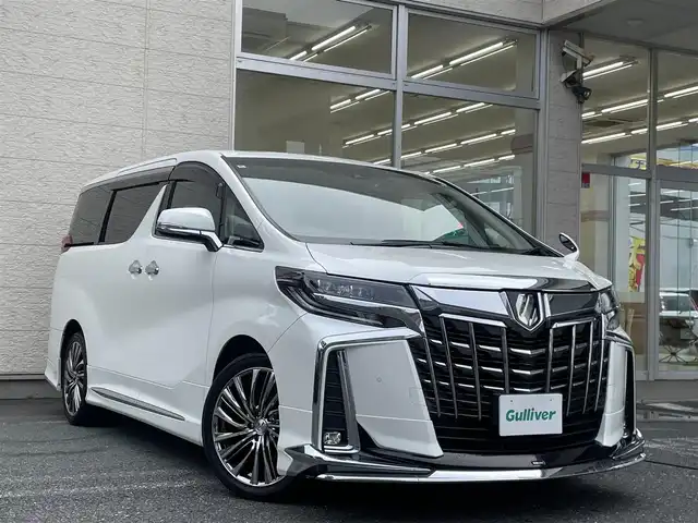 トヨタ アルファード S Aパッケージ 埼玉県 2018(平30)年 3.3万km ホワイトパールクリスタルシャイン /モデリスタエアロ//モデリスタマフラー//純正9型メモリナビ//フルセグTV//バックカメラ//CD/DVD/Bluetooth//両側パワースライドドア//アダプティブクルーズコントロール//ビルトインETC2.0//スマートキーx2//LEDヘッドライト/LEDフォグ//助手席&2列目オットマン//PCS衝突軽減ブレーキ//LTA車線維持支援機能//PKSB/RSA//クリアランスソナー//W.サイドエアバッグ//カーテン.ニーエアバッグ//ABS/横滑り防止装置//前後ドライブレコーダー//オートライト/オートハイビーム//革巻きステアリング//プライバシーガラス//ドアバイザー//社外19インチAW//新車時保証書//取扱説明書//ナビ取説