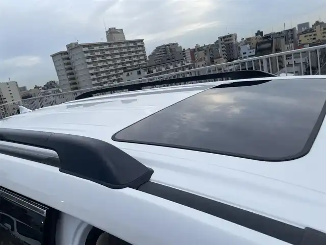 トヨタ ランドクルーザー ZX 東京都 2024(令6)年 0.2万km プレシャスホワイトパール ワンオーナー/４WD/12.3インチディスプレイナビ機能付き/【フルセグTV/Bluetooth/HDMI/USB/CD/DVD】/アランドビューモニター/リアエンターテーメントシステム/パワーバックドア/サンルーフ/ベージュ皮シート/モデリスタフェンダーガーニッシュ/モデリスタリアスカート/モデリスタフロントスポイラー/後席ディスプレイ/純正２０インチアルミ/クールBOX/Toyota Safety Sense/PCS(プリクラッシュセーフティー）/LTA(レーントレーシングアシスト）/AHS(アダプティブハイビームシステム）/RSA(ロードサインアシスト）/レーダークルーズコントロール/先行車発進お知らせ/スペアキー１本/保証書・取説・ナビ説