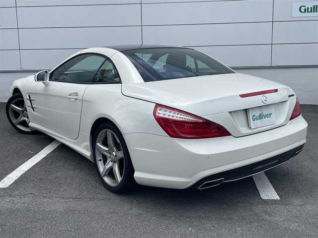 メルセデス・ベンツ ＳＬ３５０ ブルーエフィシェンシー 長崎県 2012(平24)年 8.7万km ダイヤモンドホワイト 純正メーカーナビ/CD DVD再生機能有り/レザーシート/バックカメラ/クルーズコントロール/パドルシフト/パワーシート/メモリーシート/シートヒーター/エアーサスペンション/パワーバックドア/ECOボタン/プッシュスタート/純正19インチアルミホイール/ETC/横滑り防止機能/HIDヘッドライト/スマートキー/スペアキー×1/保証書　取扱説明書