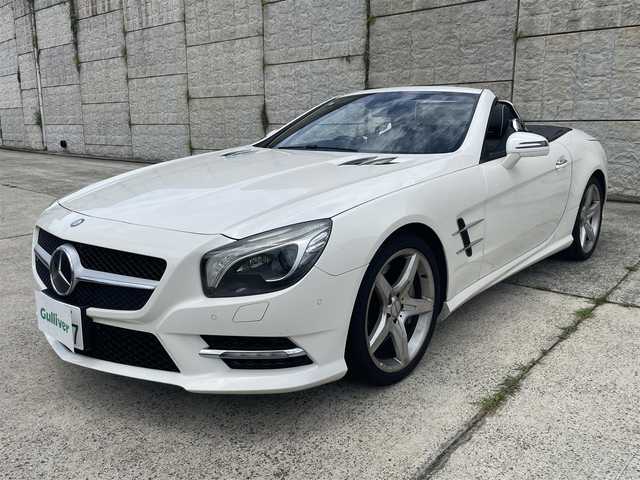 メルセデス・ベンツ ＳＬ３５０ ブルーエフィシェンシー 長崎県 2012(平24)年 8.7万km ダイヤモンドホワイト 純正メーカーナビ/CD DVD再生機能有り/レザーシート/バックカメラ/クルーズコントロール/パドルシフト/パワーシート/メモリーシート/シートヒーター/エアーサスペンション/パワーバックドア/ECOボタン/プッシュスタート/純正19インチアルミホイール/ETC/横滑り防止機能/HIDヘッドライト/スマートキー/スペアキー×1/保証書　取扱説明書