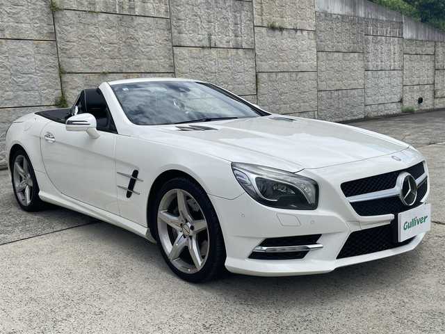 メルセデス・ベンツ ＳＬ３５０ ブルーエフィシェンシー 長崎県 2012(平24)年 8.7万km ダイヤモンドホワイト 純正メーカーナビ/CD DVD再生機能有り/レザーシート/バックカメラ/クルーズコントロール/パドルシフト/パワーシート/メモリーシート/シートヒーター/エアーサスペンション/パワーバックドア/ECOボタン/プッシュスタート/純正19インチアルミホイール/ETC/横滑り防止機能/HIDヘッドライト/スマートキー/スペアキー×1/保証書　取扱説明書