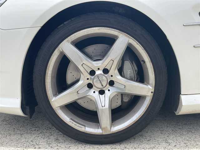 メルセデス・ベンツ ＳＬ３５０ ブルーエフィシェンシー 長崎県 2012(平24)年 8.7万km ダイヤモンドホワイト 純正メーカーナビ/CD DVD再生機能有り/レザーシート/バックカメラ/クルーズコントロール/パドルシフト/パワーシート/メモリーシート/シートヒーター/エアーサスペンション/パワーバックドア/ECOボタン/プッシュスタート/純正19インチアルミホイール/ETC/横滑り防止機能/HIDヘッドライト/スマートキー/スペアキー×1/保証書　取扱説明書