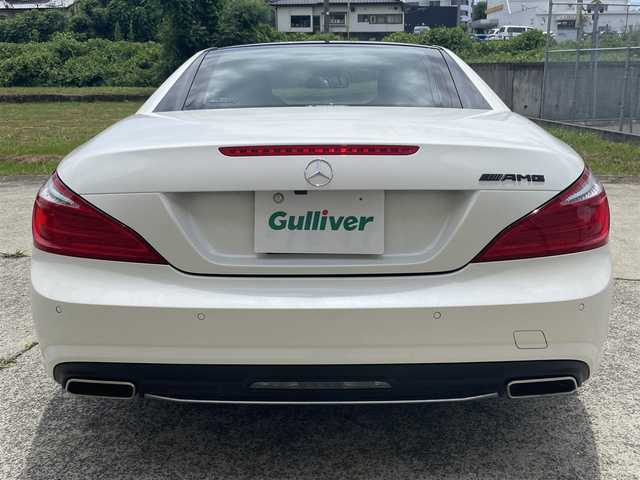 メルセデス・ベンツ ＳＬ３５０ ブルーエフィシェンシー 長崎県 2012(平24)年 8.7万km ダイヤモンドホワイト 純正メーカーナビ/CD DVD再生機能有り/レザーシート/バックカメラ/クルーズコントロール/パドルシフト/パワーシート/メモリーシート/シートヒーター/エアーサスペンション/パワーバックドア/ECOボタン/プッシュスタート/純正19インチアルミホイール/ETC/横滑り防止機能/HIDヘッドライト/スマートキー/スペアキー×1/保証書　取扱説明書