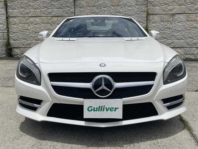 メルセデス・ベンツ ＳＬ３５０ ブルーエフィシェンシー 長崎県 2012(平24)年 8.7万km ダイヤモンドホワイト 純正メーカーナビ/CD DVD再生機能有り/レザーシート/バックカメラ/クルーズコントロール/パドルシフト/パワーシート/メモリーシート/シートヒーター/エアーサスペンション/パワーバックドア/ECOボタン/プッシュスタート/純正19インチアルミホイール/ETC/横滑り防止機能/HIDヘッドライト/スマートキー/スペアキー×1/保証書　取扱説明書