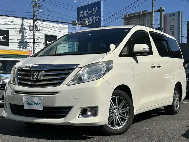 トヨタ アルファード 240X 埼玉県 2014(平26)年 9.6万km ゴールドパールクリスタルシャイン 4WD/エンジン形式：2AZ/G356197/3列シート/純正メモリナビゲーション/（CD/DVD/BT）/フルセグテレビ/バックカメラ/社外フリップダウンモニター/OP両側電動スライドドア/コーナーセンサー/電動格納ミラー/HIDヘッドライト/フォグランプ/ETC（ビルトイン）/純正アルミスタッドレス付き車載/社外17インチアルミホイール/プッシュスタート/スマートキー/ステアリングリモコン/電動格納ミラー/新車保証書/取扱説明書