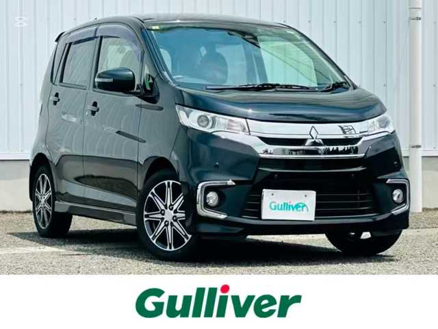 三菱 ｅＫカスタム T　セーフティPKG 熊本県 2018(平30)年 4万km アメジストブラック ワンオーナー/純正ナビ/・AM/FM/CD/DVD/SD/iPod/USB/AUX/BT/・フルセグTV/社外ドライブレコーダー/・前方/車内/横滑り防止機能/レーンキープアシスト/衝突被害軽減システム/オートマチックハイビーム/クルーズコントロール/前後コーナーセンサー/アイドリングストップ/全周囲カメラ/・バック/サイド/ETC/オートライト/・フォグランプ/・HIDライト/革巻きステアリング/・ステアリングリモコン/D席シートヒーター/電動格納ミラー/・ウィンカーミラー/ドアバイザー/純正フロアマット/純正アルミホイール/スマートキー