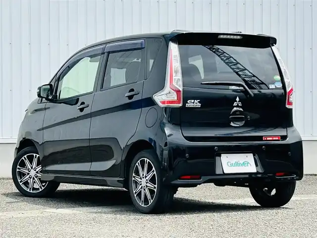 三菱 ｅＫカスタム T　セーフティPKG 熊本県 2018(平30)年 4万km アメジストブラック ワンオーナー/純正ナビ/・AM/FM/CD/DVD/SD/iPod/USB/AUX/BT/・フルセグTV/社外ドライブレコーダー/・前方/車内/横滑り防止機能/レーンキープアシスト/衝突被害軽減システム/オートマチックハイビーム/クルーズコントロール/前後コーナーセンサー/アイドリングストップ/全周囲カメラ/・バック/サイド/ETC/オートライト/・フォグランプ/・HIDライト/革巻きステアリング/・ステアリングリモコン/D席シートヒーター/電動格納ミラー/・ウィンカーミラー/ドアバイザー/純正フロアマット/純正アルミホイール/スマートキー