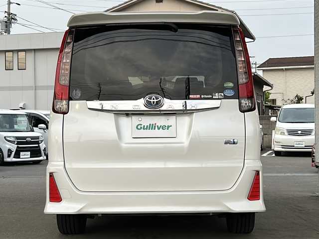 トヨタ ノア ハイブリッド Si 愛媛県 2016(平28)年 5.5万km ホワイトパールクリスタルシャイン ワンオーナー/社外メモリナビ/（CD/DVD/SD/BT/USB）/フルセグTV/バックカメラ/フリップダウンモニター/衝突軽減ブレーキ/両側パワースライドドア/スマートキー/プッシュスタート/スペアキー/アイドリングストップ/後席ロールサンシェード/保証書/取扱説明書