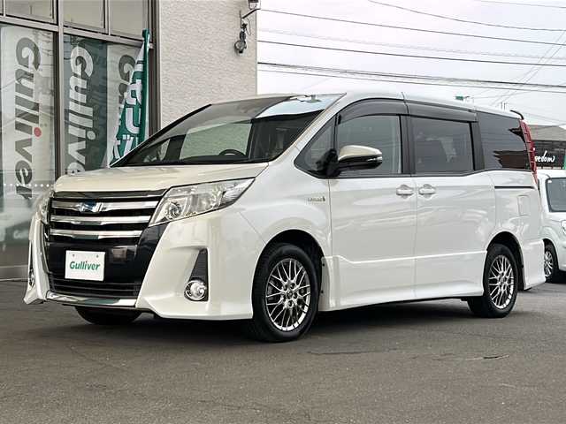 トヨタ ノア ハイブリッド Si 愛媛県 2016(平28)年 5.5万km ホワイトパールクリスタルシャイン ワンオーナー/社外メモリナビ/（CD/DVD/SD/BT/USB）/フルセグTV/バックカメラ/フリップダウンモニター/衝突軽減ブレーキ/両側パワースライドドア/スマートキー/プッシュスタート/スペアキー/アイドリングストップ/後席ロールサンシェード/保証書/取扱説明書