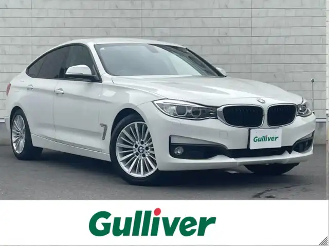 ＢＭＷ ３２０ｉ グランツーリスモ 岐阜県 2013(平25)年 5.7万km アルピンホワイトⅢ 純正HDDナビ/（フルセグTV/CD/DVD/Bluetooth/AUX）/バックカメラ/クルーズコントロール/リアパークディスタンスコントロール/メモリ機能パワーシート/電動リアゲート/キセノンヘッドライト/オートライト/本革巻きステアリング/MTモード付AT/ドライビングパフォーマンスコントロール/アイドリングストップ/純正18インチAW/純正フロアマット/純正ドライブレコーダー/純正ETC/スマートキー×2