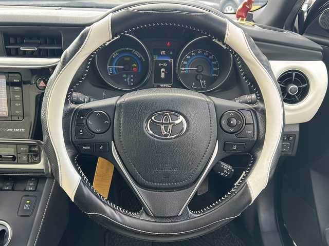 トヨタ オーリスハイブリッド Gパッケージ 愛知県 2016(平28)年 9.7万km ブラックマイカ /純正ナビ/フルセグTV//Bluetooth/CD・DVD//バックカメラ/ビルトインETC//社外デジタルインナーミラー//トヨタセーフティセンスC//プリクラッシュセーフティ//レーンディパーチャーアラート//クリアランスソナー//クルーズコントロール//先行車発進お知らせ//専用本革×ウルトラスエードシート//前席シートヒーター//LEDオートライト//電動格納ミラーウィンカー//プッシュスタート//ISOFIX//純正フロアマット/純正ドアバイザー//取扱説明書/新車保証書//スペアキー//車検R9年５月２３日まで