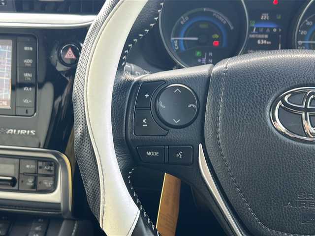 トヨタ オーリスハイブリッド Gパッケージ 愛知県 2016(平28)年 9.7万km ブラックマイカ /純正ナビ/フルセグTV//Bluetooth/CD・DVD//バックカメラ/ビルトインETC//社外デジタルインナーミラー//トヨタセーフティセンスC//プリクラッシュセーフティ//レーンディパーチャーアラート//クリアランスソナー//クルーズコントロール//先行車発進お知らせ//専用本革×ウルトラスエードシート//前席シートヒーター//LEDオートライト//電動格納ミラーウィンカー//プッシュスタート//ISOFIX//純正フロアマット/純正ドアバイザー//取扱説明書/新車保証書//スペアキー//車検R9年５月２３日まで