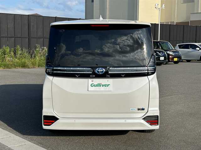 トヨタ ヴォクシー ハイブリッド S－Z 山形県 2025(令7)年 0.1万km未満 ホワイトパールクリスタルシャイン 純正HDDナビ/(フルセグTV/Bluetooth/USB/HDMI)/フリップダウンモニター/両側パワースライドドア/クルーズコントロール/バックカメラ/ETC2.0/シートヒーター/ハンドルヒーター/純正LEDライト/純正アルミホイール/ハーフレザーシート