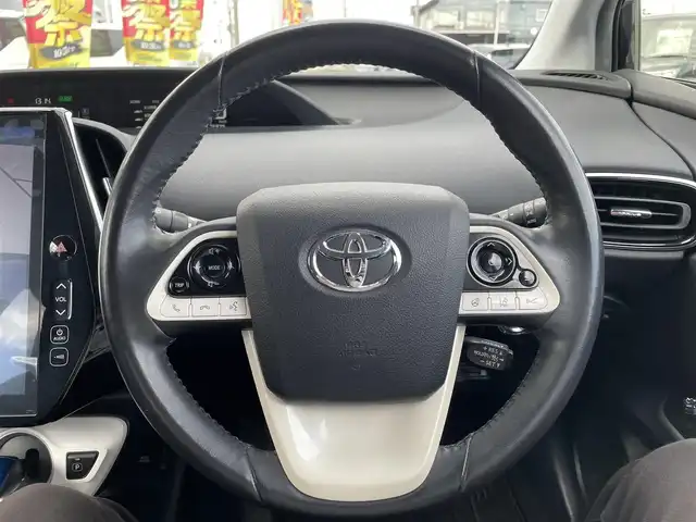 トヨタ プリウス ＰＨＶ A 千葉県 2017(平29)年 7.7万km アティチュードブラックマイカ ワンオーナー/純正11.6インチTコネクトSDナビ/・フルセグTV/Bluetooth/バックカメラ/トヨタセーフティーセンス/・プリクラッシュセーフティー/・レーンディパーチャーアラート/・インテリジェントクリアランスソナー/・ブラインドスポットモニター/・アダプティブクルーズコントロール/前席シートヒーター/ステアリングヒーター/AC100V1500W電源/前後コーナーセンサー/純正LEDヘッドライト/フォグランプ/純正17インチアルミホイール/スマートキー/純正ビルトインETC2.0/本革巻きステアリング/サイド＆カーテンエアバッグ/新車時保証書＆取扱説明書