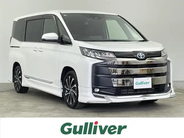 トヨタ ノア ハイブリッド S－Z 千葉県 2022(令4)年 2万km ホワイトパールクリスタルシャイン 禁煙車/モデリスタエアロ/トヨタセーフティーセンス/・プリクラッシュセーフティー/・レーンディパーチャーアラート/・レーダークルーズコントロール/・ロードサインアシスト/・ドライバー異常時対応システム/快適利便パッケージHigh/純正10.5インチディスプレイオーディオ/　ナビキッド/CD/DVD/BT/フルセグTV/純正14インチフリップダウンモニター/両側パワースライドドア/デジタルインナーミラー/コーナーセンサー/オートハイビーム/ヘッドアップディスプレイ/純正17インチアルミホイール