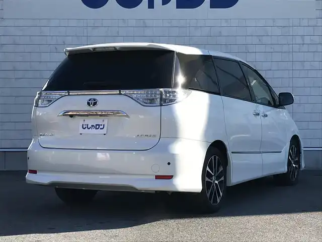 トヨタ エスティマ アエラス プレミアムエディション 栃木県 2013(平25)年 12.4万km ホワイトパールクリスタルシャイン (株)IDOMが運営する【じしゃロン小山店】の自社ローン対象車両になります。こちらは現金ご利用時の価格です。/自社ローンご希望の方は別途その旨お申付け下さい。//禁煙車/社外フルセグナビ/（CD/DVD/AM/FMラジオ）/(Bluetooth)/スマートキー/プッシュスタート/バックカメラ/ＥＴＣ/両側パワースライドドア/フリップダウンモニター/パワーシート/クルーズコントロール/コーナーセンサー/ドライブレコーダー/デジタルインナーミラー/オットマン/ステアリングリモコン/電動格納ドアミラー/パワーウインドウ/オートライト/防眩ミラー/シートカバー