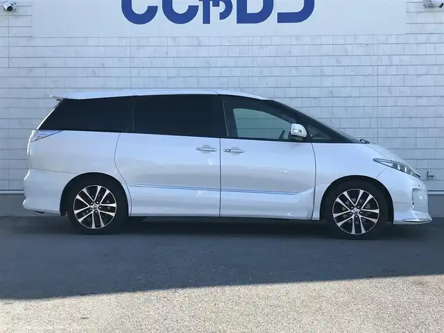 トヨタ エスティマ アエラス プレミアムエディション 栃木県 2013(平25)年 12.4万km ホワイトパールクリスタルシャイン (株)IDOMが運営する【じしゃロン小山店】の自社ローン対象車両になります。こちらは現金ご利用時の価格です。/自社ローンご希望の方は別途その旨お申付け下さい。//禁煙車/社外フルセグナビ/（CD/DVD/AM/FMラジオ）/(Bluetooth)/スマートキー/プッシュスタート/バックカメラ/ＥＴＣ/両側パワースライドドア/フリップダウンモニター/パワーシート/クルーズコントロール/コーナーセンサー/ドライブレコーダー/デジタルインナーミラー/オットマン/ステアリングリモコン/電動格納ドアミラー/パワーウインドウ/オートライト/防眩ミラー/シートカバー