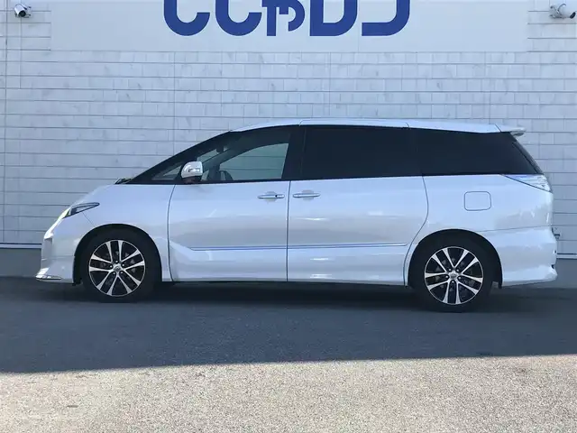 トヨタ エスティマ アエラス プレミアムエディション 栃木県 2013(平25)年 12.4万km ホワイトパールクリスタルシャイン (株)IDOMが運営する【じしゃロン小山店】の自社ローン対象車両になります。こちらは現金ご利用時の価格です。/自社ローンご希望の方は別途その旨お申付け下さい。//禁煙車/社外フルセグナビ/（CD/DVD/AM/FMラジオ）/(Bluetooth)/スマートキー/プッシュスタート/バックカメラ/ＥＴＣ/両側パワースライドドア/フリップダウンモニター/パワーシート/クルーズコントロール/コーナーセンサー/ドライブレコーダー/デジタルインナーミラー/オットマン/ステアリングリモコン/電動格納ドアミラー/パワーウインドウ/オートライト/防眩ミラー/シートカバー