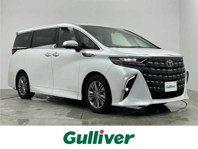 トヨタ アルファード Z 愛知県 2024(令6)年 1.8万km プラチナホワイトパールマイカ 純正14型ナビ（フルセグ、Bluetooth、HDMI、AppleCarplay)/13型有機ELフリップダウンモニター/トヨタチームメイト/左右独立サンルーフ/全方位カメラ/デジタルインナーミラー/BSM/HUD/ACC/置くだけ充電器/パーキングアシスト/両側パワスラドア/ETC2.0/360度ドライブレコーダー/パワーバックドア/パワーシート（D+N)/1・2列目シートヒーター、エアシート/衝突軽減ブレーキ/レーンキープアシスト/電子パーキング/オートホールド/USB/コーナーセンサー/LEDヘッドライト/オートハイビーム/オートライト/社外フロアマット/純正18インチAW/スマートキー/横滑り防止装置/三点エアバック