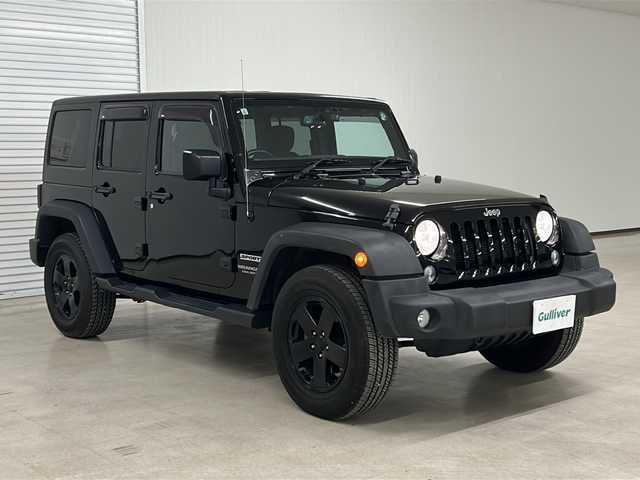 クライスラー・ジープ ジープ ラングラー アンリミテッド スポーツ 熊本県 2017(平29)年 7.1万km 黒 社外メモリナビ（ＣＤ/ラジオ/ＢＴ/フルセグ）/バックカメラ/ＥＴＣ/ドライブレコーダー/クルーズコントロール/ステアリングスイッチ/横滑り防止装置/リモコンキー×２/純正18インチＡＷ/ドアバイザー/純正ゴムマット