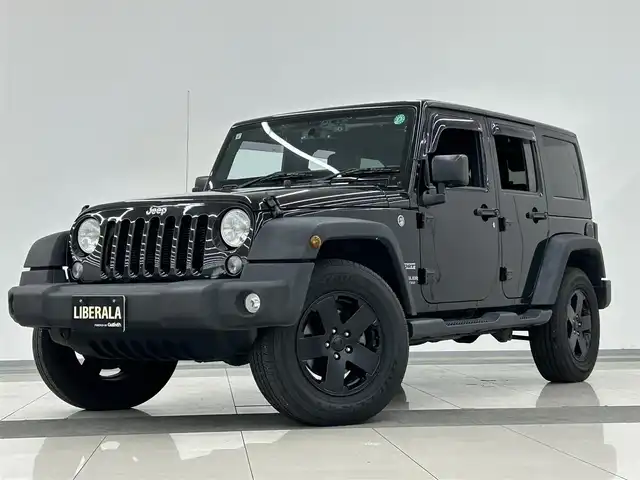 クライスラー・ジープ ジープ ラングラー アンリミテッド スポーツ 岡山県 2017(平29)年 7.1万km ブラック 社外メモリナビ（ＣＤ/ラジオ/ＢＴ/フルセグ）/バックカメラ/ＥＴＣ/ドライブレコーダー/クルーズコントロール/ステアリングスイッチ/横滑り防止装置/リモコンキー×２/純正18インチＡＷ/ドアバイザー/純正ゴムマット