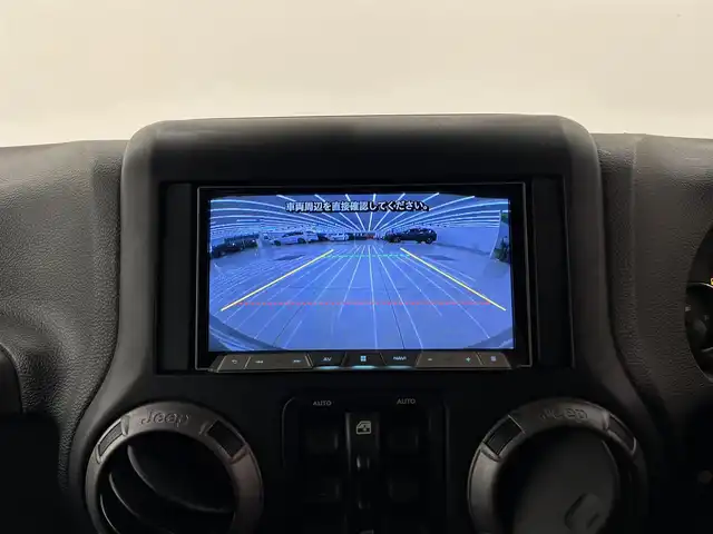 クライスラー・ジープ ジープ ラングラー アンリミテッド スポーツ 岡山県 2017(平29)年 7.1万km ブラック 社外メモリナビ（ＣＤ/ラジオ/ＢＴ/フルセグ）/バックカメラ/ＥＴＣ/ドライブレコーダー/クルーズコントロール/ステアリングスイッチ/横滑り防止装置/リモコンキー×２/純正18インチＡＷ/ドアバイザー/純正ゴムマット