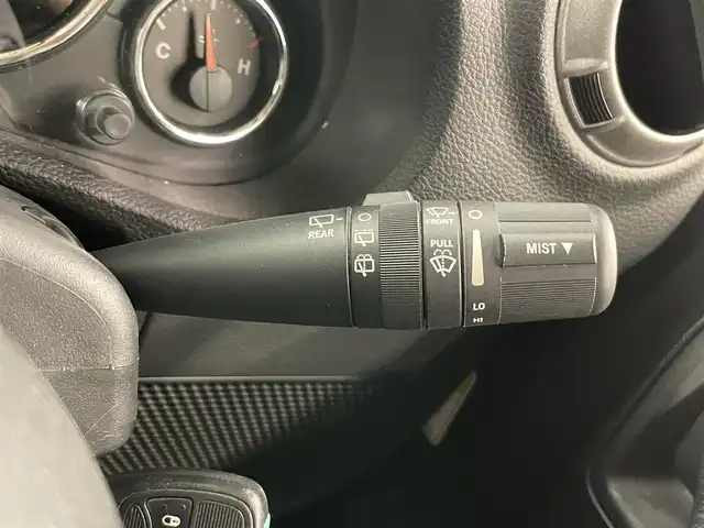 クライスラー・ジープ ジープ ラングラー アンリミテッド スポーツ 岡山県 2017(平29)年 7.1万km ブラック 社外メモリナビ（ＣＤ/ラジオ/ＢＴ/フルセグ）/バックカメラ/ＥＴＣ/ドライブレコーダー/クルーズコントロール/ステアリングスイッチ/横滑り防止装置/リモコンキー×２/純正18インチＡＷ/ドアバイザー/純正ゴムマット