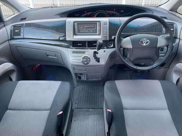 トヨタ エスティマ アエラス 愛知県 2006(平18)年 11万km ブラック /革巻きステア/ステアスイッチ/パワスラ/純正フロアマット/純正ドアバイザー/照明付きバニティミラー/HIDオートライト/フォグ/ETC/プッシュスタート/スマートキー