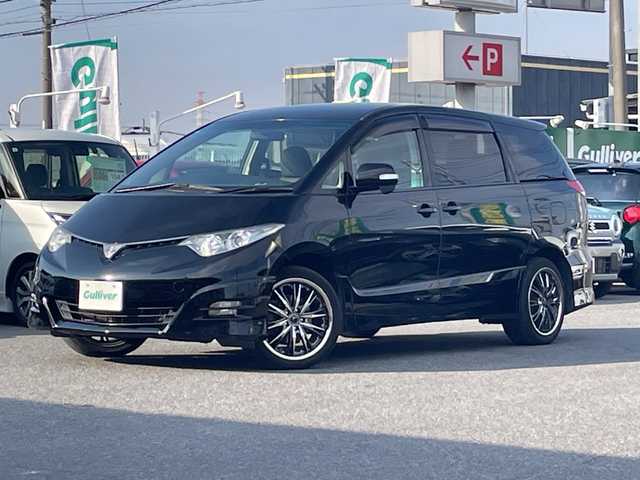 トヨタ エスティマ アエラス 愛知県 2006(平18)年 11万km ブラック /革巻きステア/ステアスイッチ/パワスラ/純正フロアマット/純正ドアバイザー/照明付きバニティミラー/HIDオートライト/フォグ/ETC/プッシュスタート/スマートキー