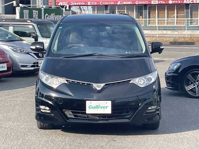 トヨタ エスティマ アエラス 愛知県 2006(平18)年 11万km ブラック /革巻きステア/ステアスイッチ/パワスラ/純正フロアマット/純正ドアバイザー/照明付きバニティミラー/HIDオートライト/フォグ/ETC/プッシュスタート/スマートキー