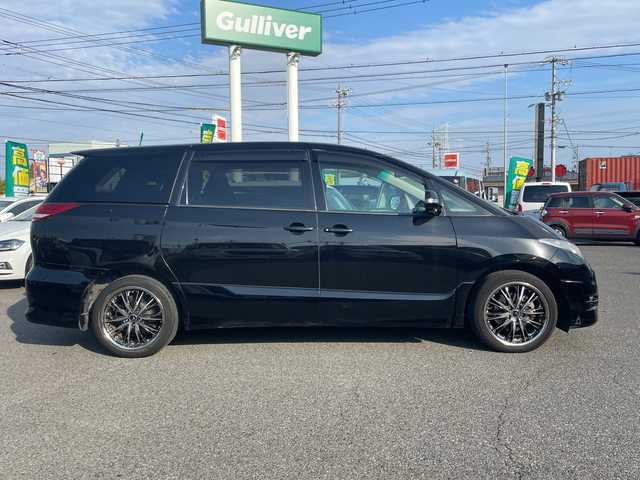 トヨタ エスティマ アエラス 愛知県 2006(平18)年 11万km ブラック /革巻きステア/ステアスイッチ/パワスラ/純正フロアマット/純正ドアバイザー/照明付きバニティミラー/HIDオートライト/フォグ/ETC/プッシュスタート/スマートキー