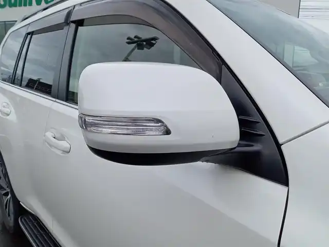 トヨタ ランドクルーザー プラド TZ－G 福井県 2018(平30)年 3.5万km ホワイトパールクリスタルシャイン 衝突被害軽減システム/メーカーOPナビ（B9129）/・（フルセグTV/CD/DVD/Bluetooth）/アラウンドビューモニター/ビルトインETC2.0/モデリスタエアロ/ステアリングスイッチ/シートヒーター・クーラー/前席パワーシート/オートLEDライト/電動格納ウィンカーミラー/純正19インチAW/純正フロアマット/スマートキー