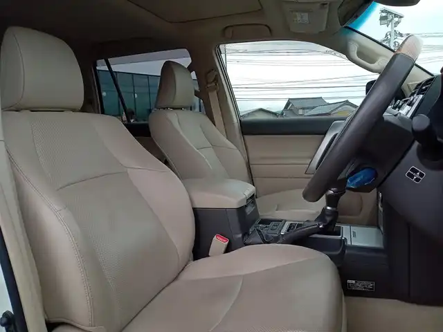 トヨタ ランドクルーザー プラド TZ－G 福井県 2018(平30)年 3.5万km ホワイトパールクリスタルシャイン 衝突被害軽減システム/メーカーOPナビ（B9129）/・（フルセグTV/CD/DVD/Bluetooth）/アラウンドビューモニター/ビルトインETC2.0/モデリスタエアロ/ステアリングスイッチ/シートヒーター・クーラー/前席パワーシート/オートLEDライト/電動格納ウィンカーミラー/純正19インチAW/純正フロアマット/スマートキー
